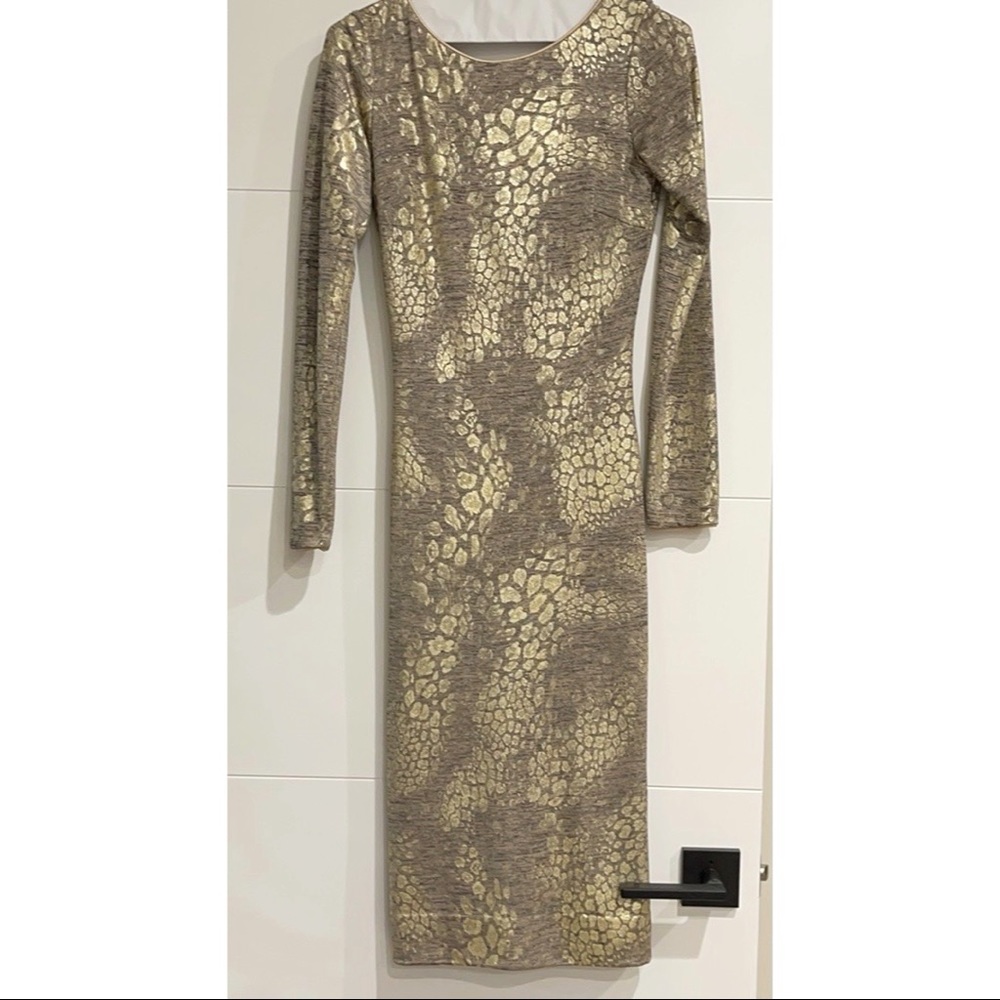 Dress the Population long sleeve midi cocktail dress with low back.